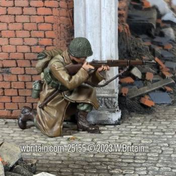 WW2: U.S. Infantryman Kneeling Firing in Greatcoat Winter 1944-45