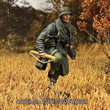 WW2: German Grenadier Running in Greatcoat With Spare MG 42 Barrel 1943-45