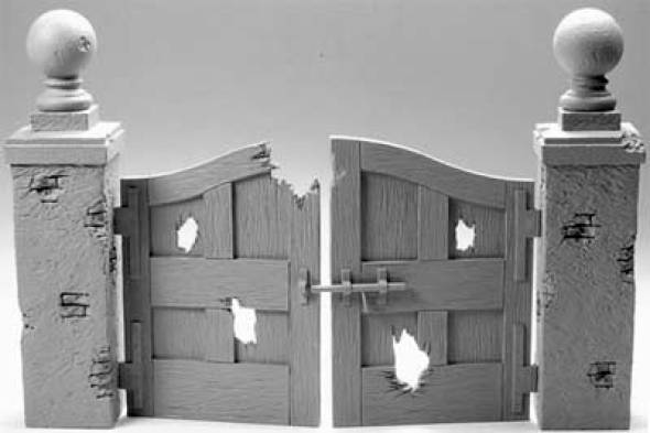 Damaged Brick & Stucco Pillars with Gate