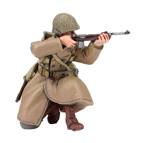 WW2: U.S. 101st Airborne Infantry Wearing Overcoat Kneeling Firing Carbine, Winter 1944-45