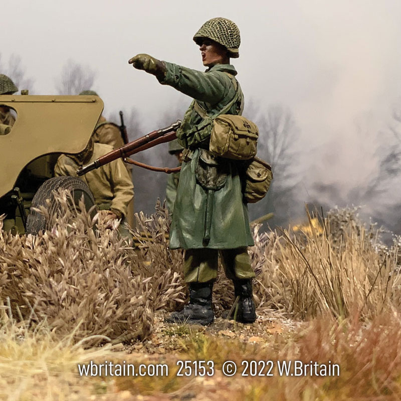 WW2: U.S. Infantryman in Raincoat Pointing 1943-45