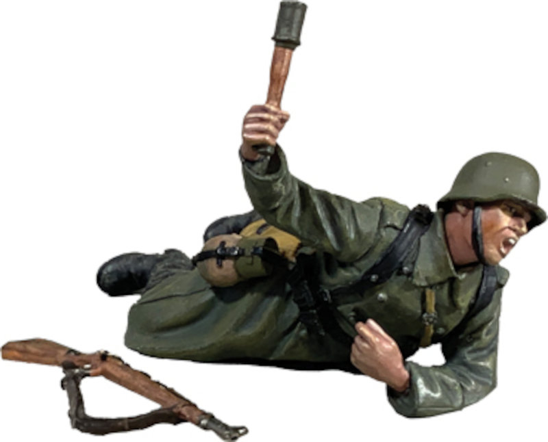 WW2: WW2: German Grenadier in Greatcoat Prone Throwing Grenade, 1942-45